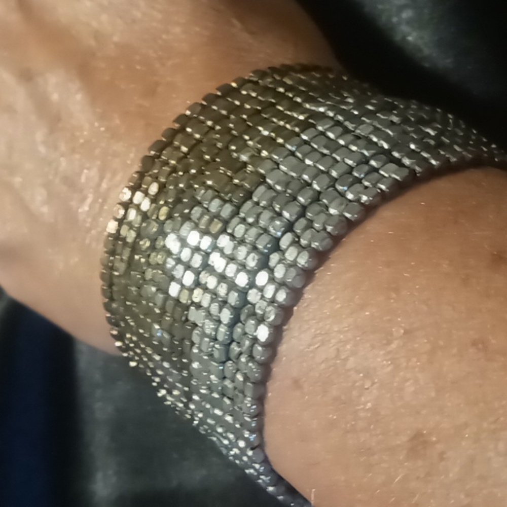 Metal beaded wrapped bronze & silver mixed beads. Expandable